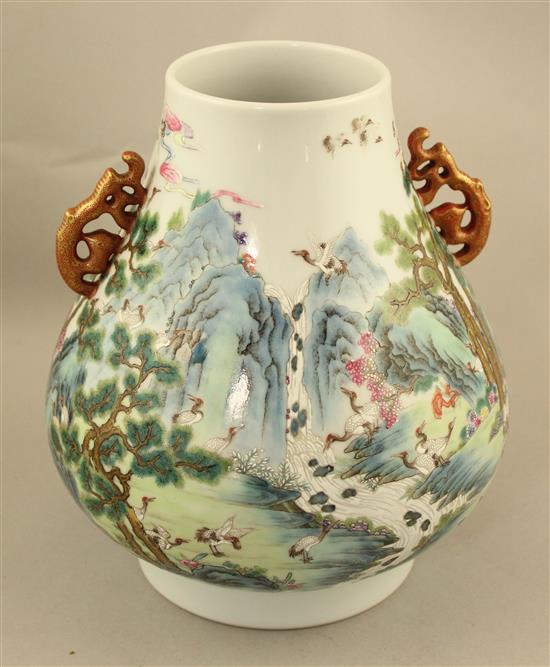 A Chinese famille verte pear shaped vase, Hu, 21cm